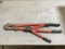 Red bolt cutters, black and red bolt cutters