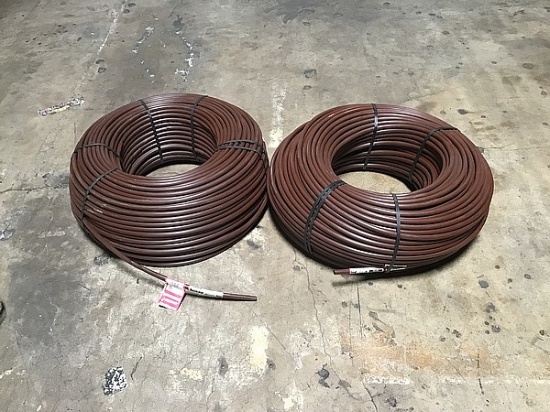 Two sets of 18” brown irrigation pipes