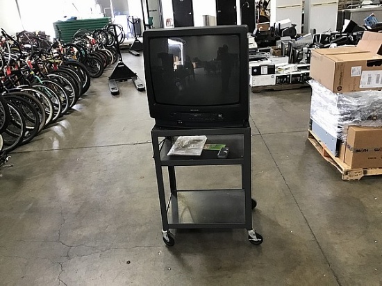 SHARP tv with black tv stand cart