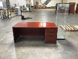 One office desk with one glass display cabinet