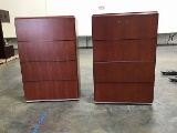 Two wood four drawer file cabinets