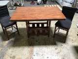 Large wooden dining/kitchen table with two chairs