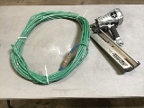 Green air hose, silver hitachi 3 1/2” framing nailer