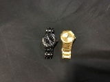Nixon gold colored watch with black watch