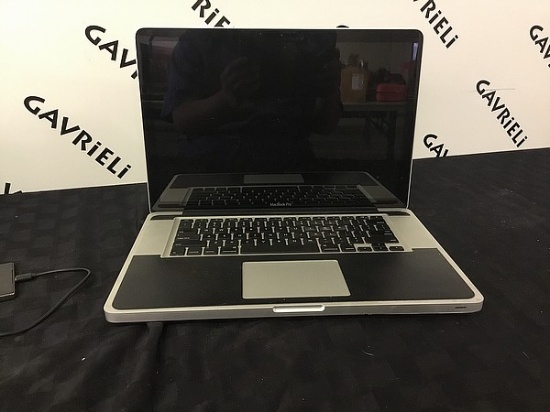 MacBook Pro,model 1286, possibly locked, no charger HARD DRIVE POSSIBLY REMOVED