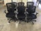 6 black office chairs