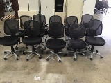 Ten black office chairs
