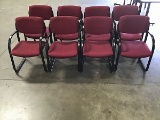 Eight red lobby chairs