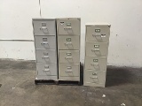 Three four drawer file cabinets