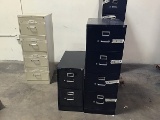 4 metal file cabinets