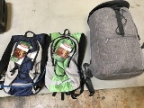 Two Coleman hydration bags with Coleman sleeping bag