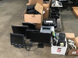 Pallet of monitors , phone system, computer towers, printer Typewriter