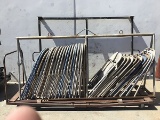 Thirty metal chairs,two cart,one piece of metal and weights bar