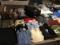 Backpacks, clothing, shoes, toys, tennis racket Headphones, hats,