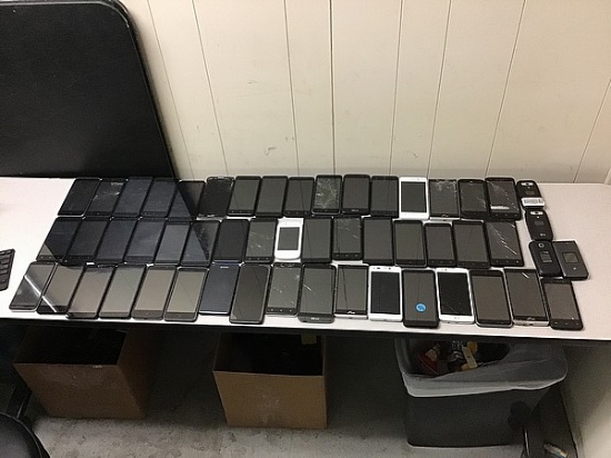 Box of cellphones POSSIBLY LOCKED, SOME DAMAGE, UNKNOWN ACTIVATION STATUS