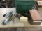 Green box with impulse sealer, metal box with metal letter stencils Bag sealer