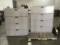 Two four drawer metal cabinets