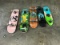 Orange skateboard, black/green skateboard, plunked skateboard Pink skateboard, turtle skateboard