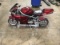 Red pocket rocket mini motorcycle