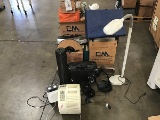 Pallet of assorted office supplies (Staplers, hole punchers, clipboards, fans, lights ex.)