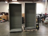 Two tall matal cabinet with shelves