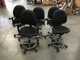 5 black office chairs