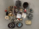 Assorted jewelry, belt buckles