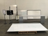 Different sizes whiteboards and standing boards and one table