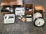 Pallet with two typewriters, clocks, Sony camera,