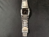 Nixon black and silver watch