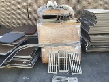 Three pallets of disassembled plastic shelves