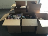 7 boxes of assorted hats,shoes,belts,sleepers,purses and more.