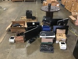 Pallet of assorted office supplies, monitors, printer, keyboards Zebra label printers, wood round ta