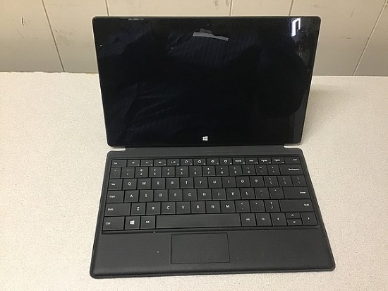 Laptop computer possibly locked, some damage, no charger Microsoft surface 32GB