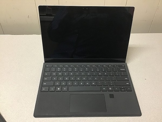 Laptop computer possibly locked, no charger, some damage Microsoft surface 256GB