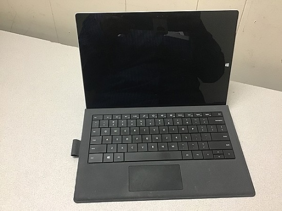 Laptop computer possibly locked, no charger, some damage Microsoft surface