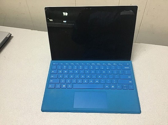 Laptop computer possibly locked, no charger, some damage Microsoft surface
