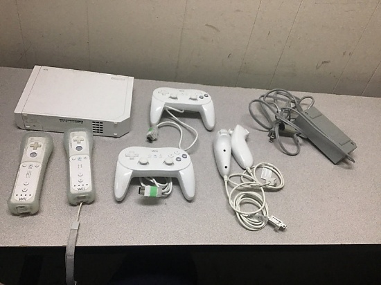 Nintendo Wii with controllers NOTE: This unit is being sold AS IS/WHERE IS via Timed Auction and is