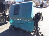 TENNANT 5700 FLOOR MACHINE (BAD RIGHT TIRE) NOTE: This unit is being sold AS IS/WHERE IS via Timed A