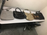 Purses (Use) NOTE: This unit is being sold AS IS/WHERE IS via Timed Auction and is located in Rivers