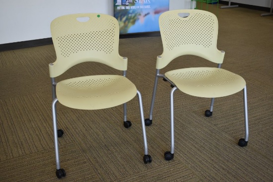 2 Yellow Herman Miller Caper Stack Chair's