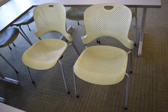 2 Yellow Herman Miller Caper Stack Chair's