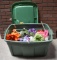 Plastic Tote Full of Artificial Flowers
