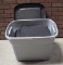 Plastic Tote Full of Black Duvetyne