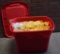 Plastic Tote Full of Gold Spandex Sashes
