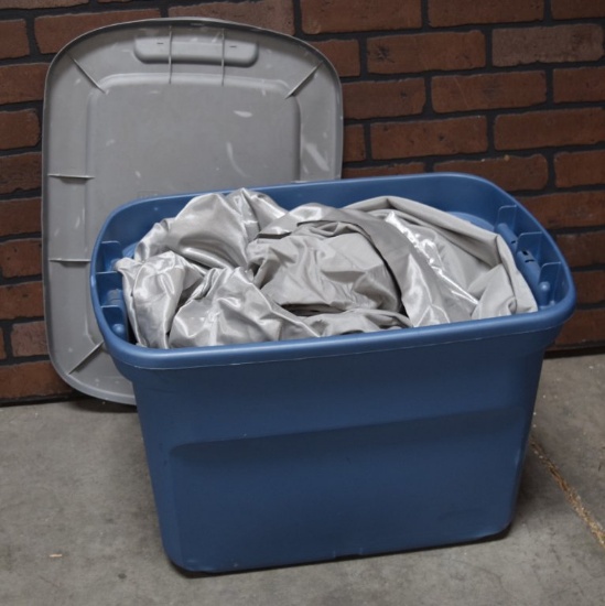 Plastic Tote Full of Silver Spandex Panels