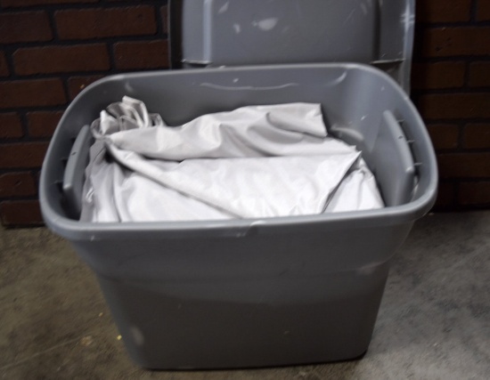 Plastic Tote Full of Silver Metal Sheen Panels