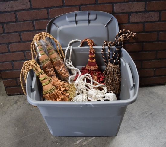 Plastic Tote Full of Tassels