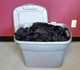 Plastic Tote Full of Black Spandex Table Linens