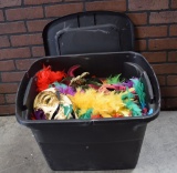 Plastic Tote Full Of Mardi Gras Party Favors